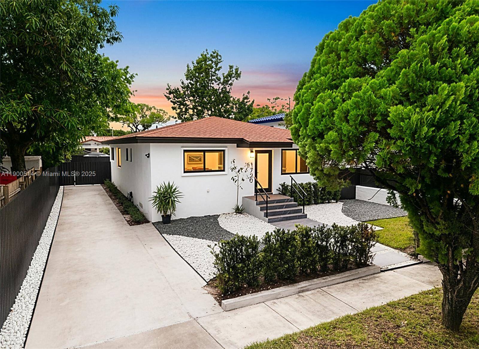 Modern 3 bed, 3 bath home with a detached cottage meticulously renovated.