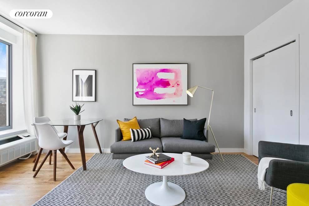 This extra spacious home features a large living space, plus floor to ceiling windows allowing for open views and great sunlight.