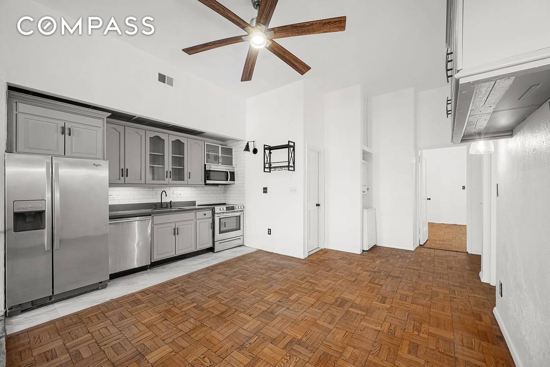 The historic brownstone is a charming duplex with a classic design, located in a historic neighborhood.