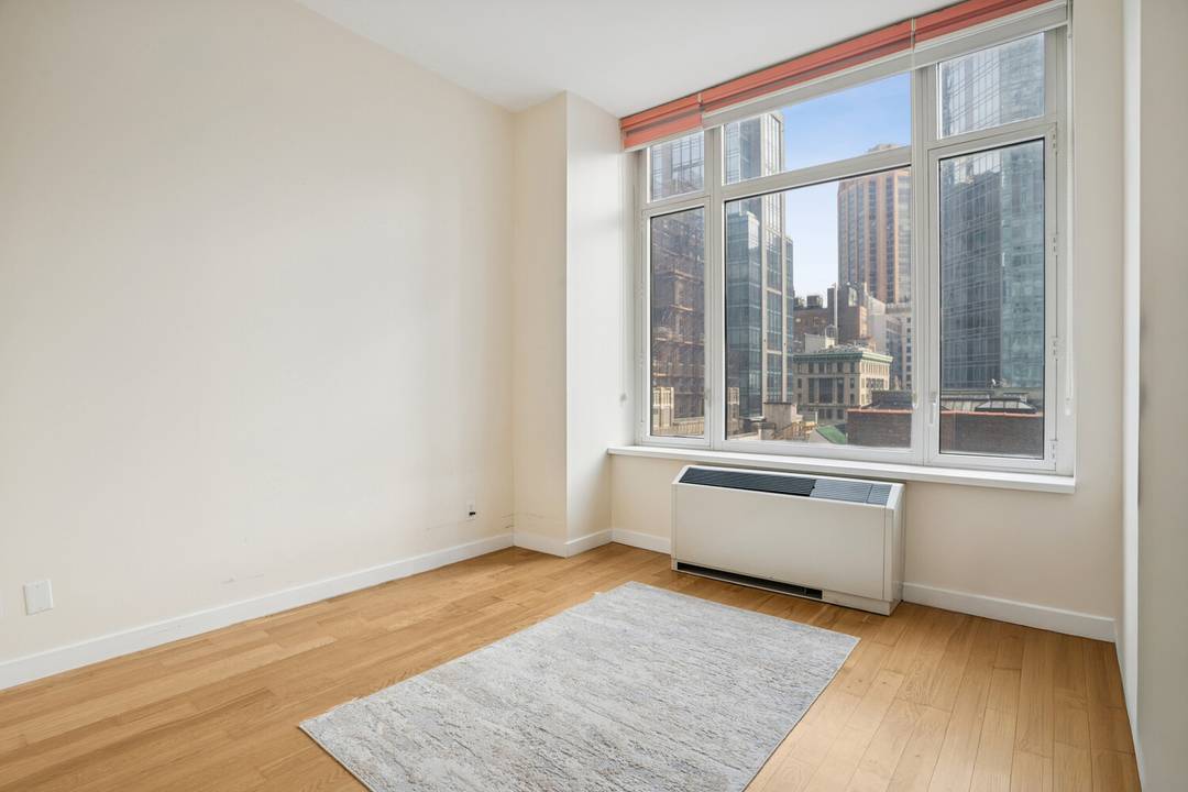 Spacious full sized 2 bedrooms with 2 full bathrooms in luxurious condominium unit in the heart of Midtown of Manhattan on Fifth Ave, with the view of Empire State Building ...