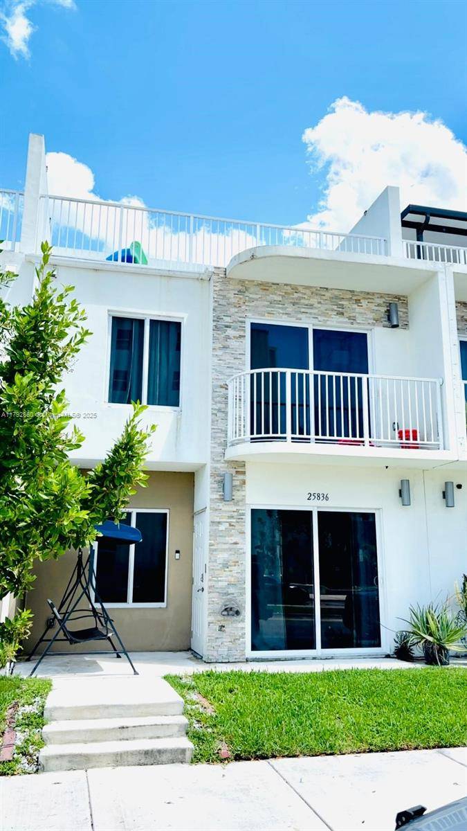 Beautiful 4 Bedroom, 3. 5 Bath Tri Level Townhome with a unique Concrete Rooftop Terrace perfect for relaxing and family gatherings.