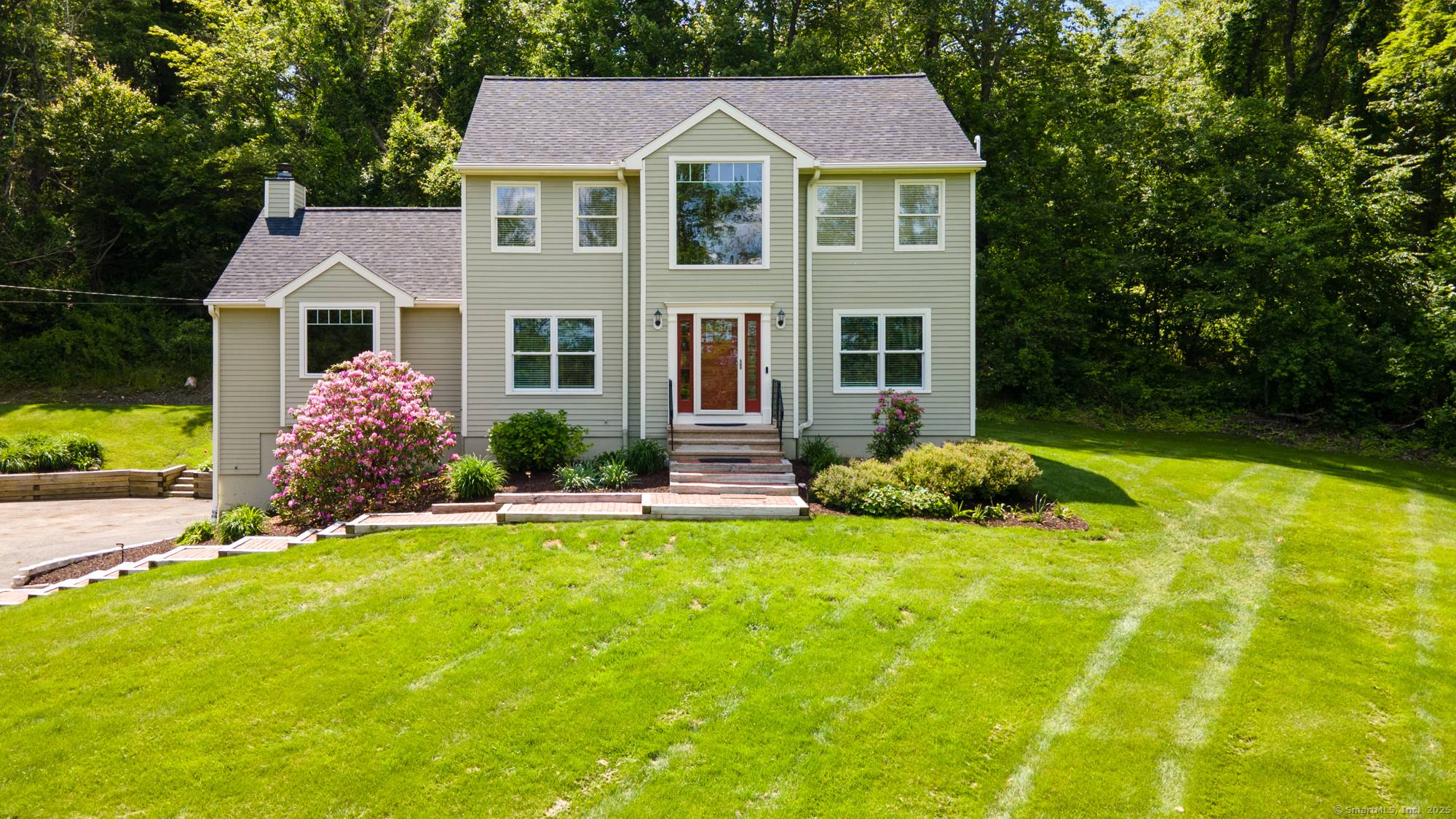 Majestically perched on 2 private acres, this beautifully maintained three bedroom Colonial offers seasonal panoramic views of rolling hills and treetops, providing a picturesque year round backdrop while being close ...