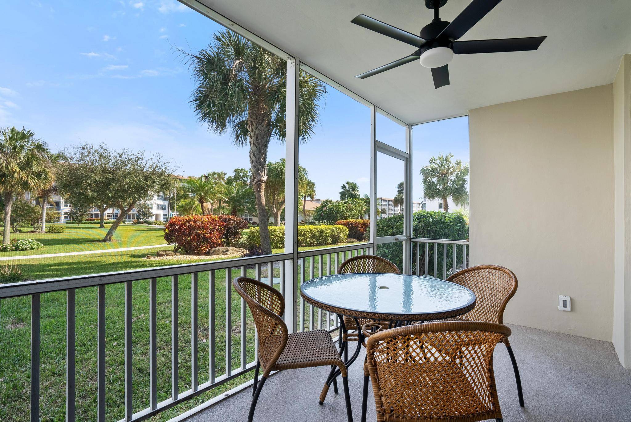 100 updated, 1st floor corner unit w impact door, sliders, windows in east Delray Beach community of Tropic Bay.