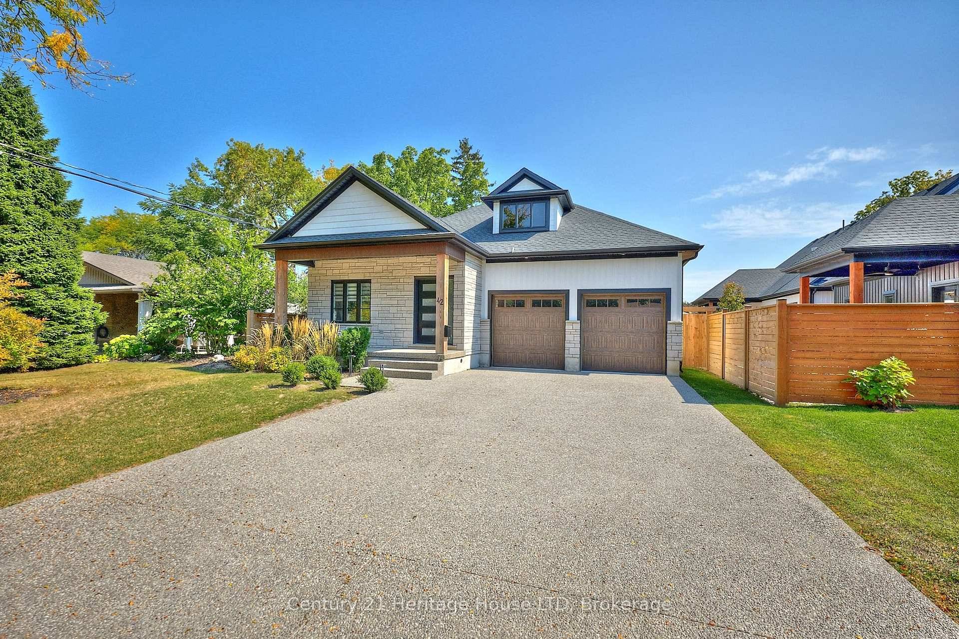 Exquisite custom built bungalow with over 3500 sq ft of finished living space, featuring in law capability with a 2nd kitchen and separate walk up from the lower level, all ...