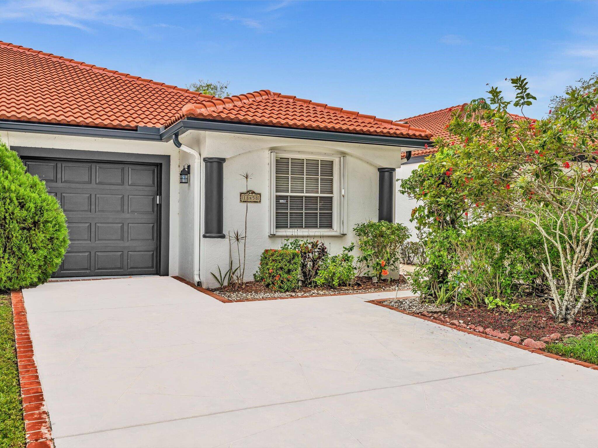 Lowest Priced Home in the Beautiful Tree Lined Neighborhood of Villa San Remo !