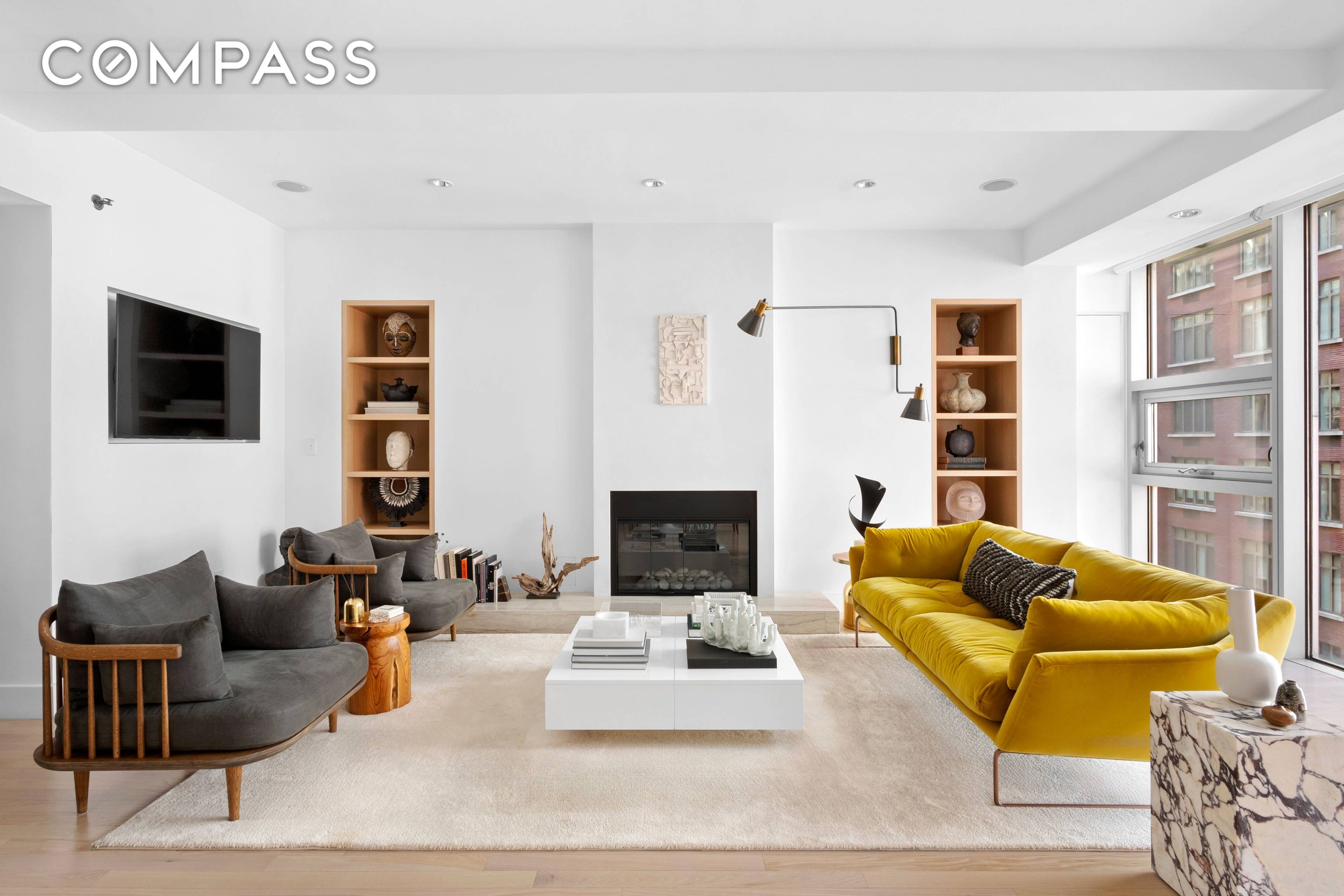 This stunning floor through two bedroom, two bath home was renovated and redesigned to the highest standards and offers the perfect combination of loft style living with a modern aesthetic.