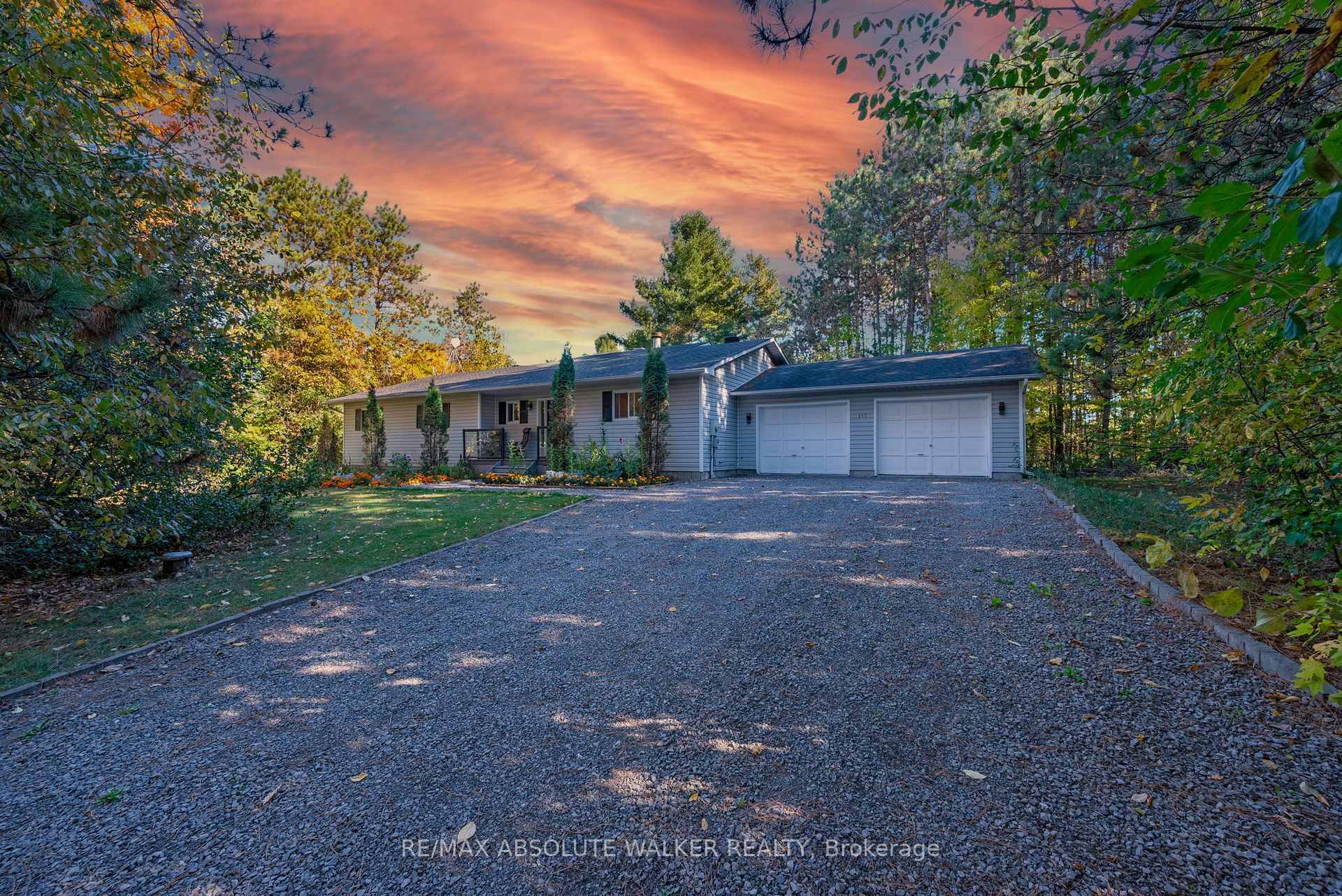 Welcome to 117 Plantation Drive in Woodlawn, a beautifully maintained 3 bedroom, 2 bathroom bungalow set on just under 3 acres of tranquil land.