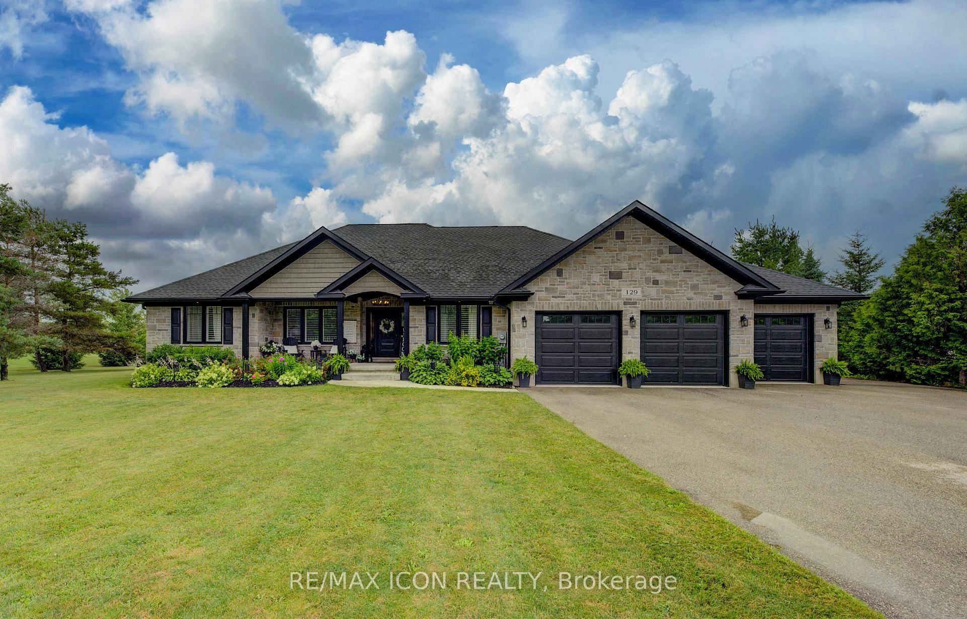 Welcome to this stunning executive bungalow nestled on a picturesque 1.
