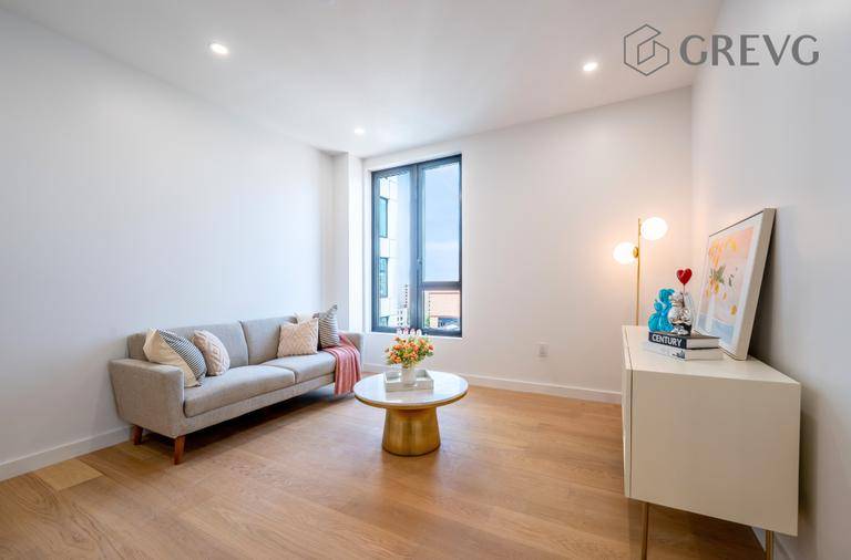 South and east facing Residence 4F offers a bright layout with oversized windows and a private balcony.