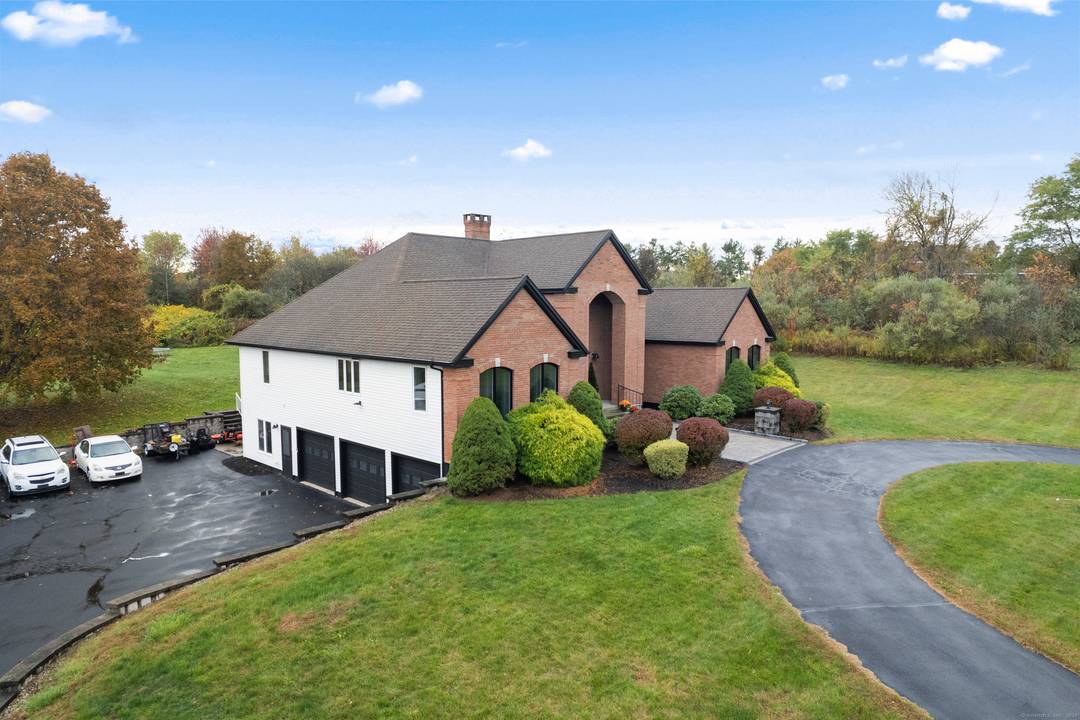 Experience the perfect blend of space, style, and comfort in this stunning contemporary ranch set on over 5 acres of land !