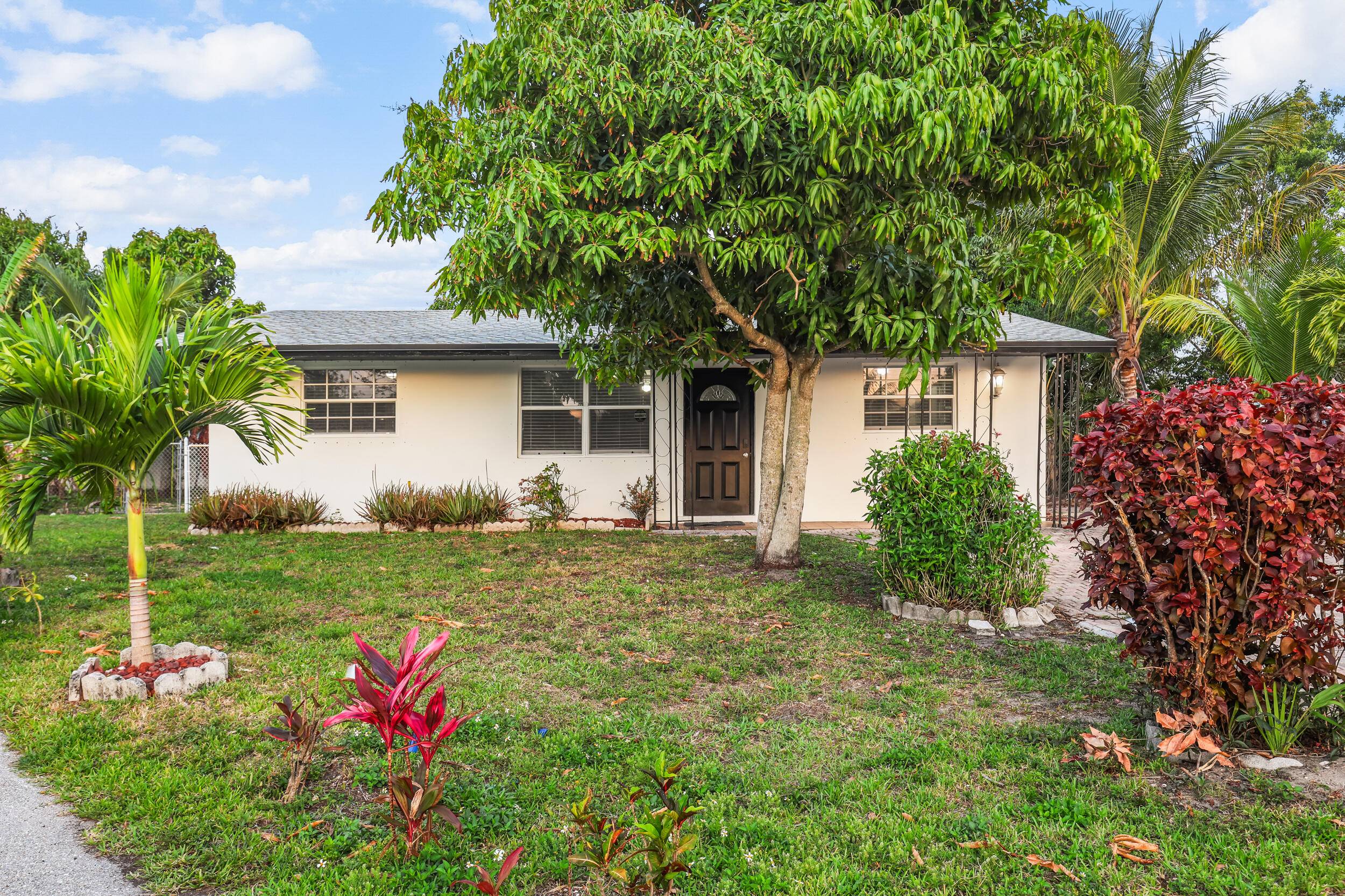 This charming home is in the heart of West Palm Beach, just 10 minutes from Palm Beach International Airport, 15 minutes from downtown, and a 10 minute walk to a ...