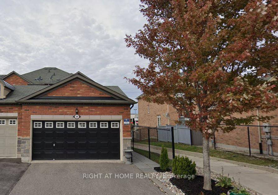 Beautiful end unit townhouse in Bayview Meadows overlooking plaza with many grocery stores and restaurants.