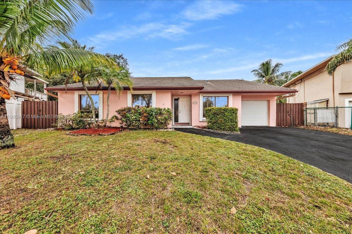 Welcome to this Beautiful 2092 sqft home in the prestigious Town of Davie, nestled on the largest lot in the neighborhood.