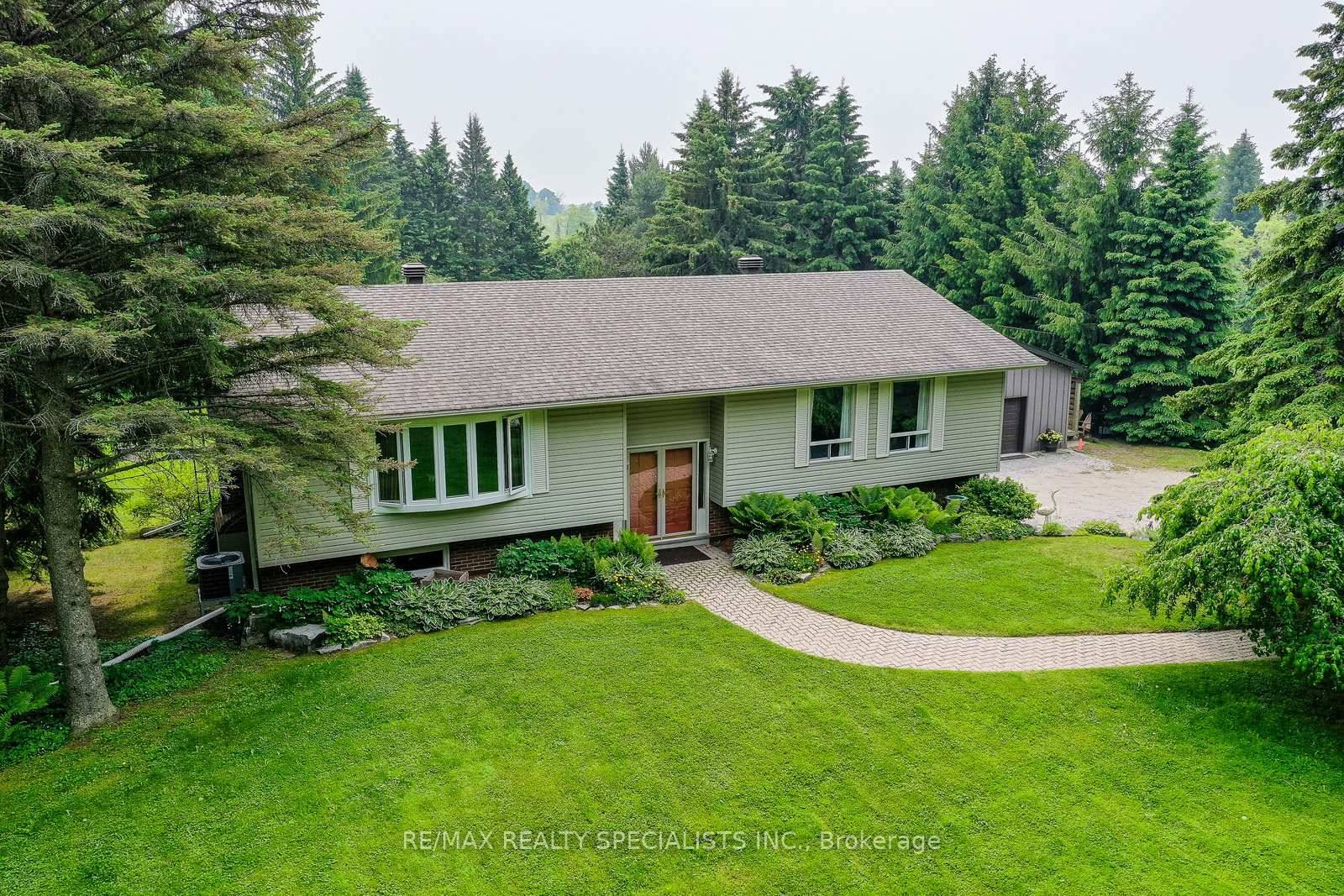 Welcome to 6739 Castlederg Sideroad an exceptional raised bungalow offering over 3, 000 sq ft of beautifully finished living space.