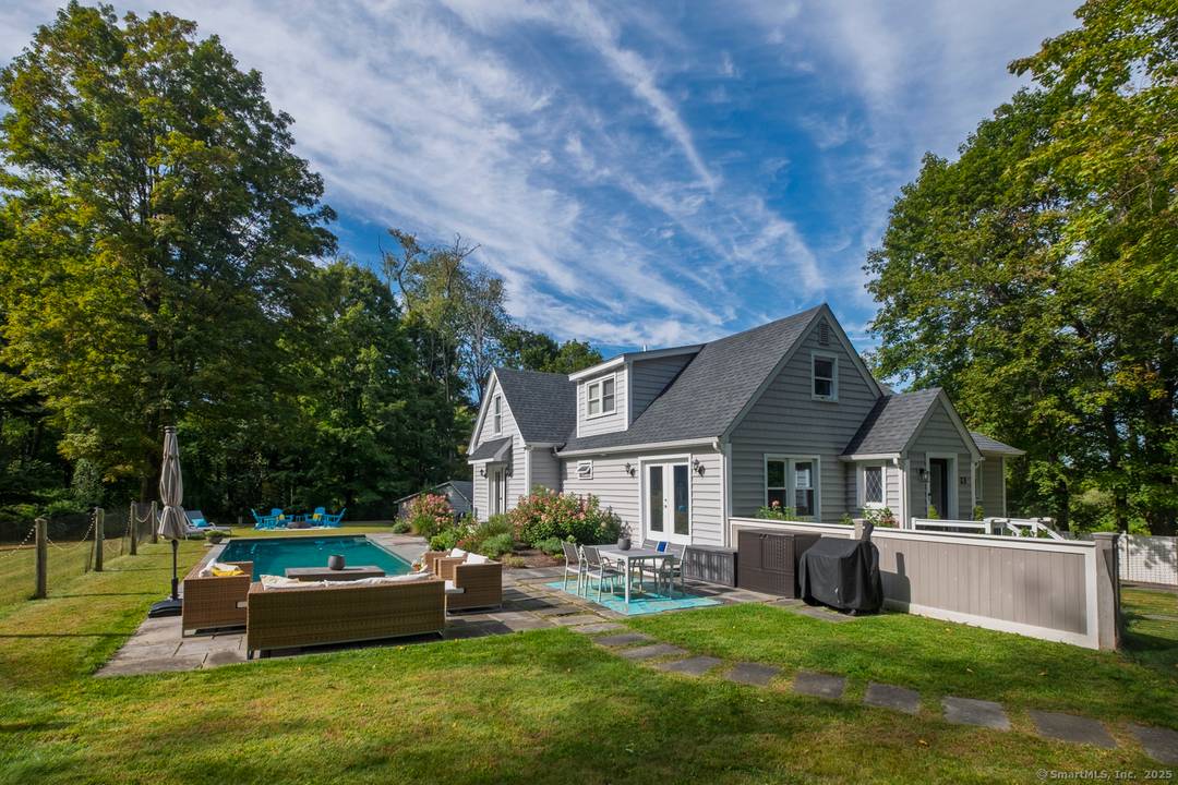 Step into a world where timeless farmhouse architecture meets modern sophistication.