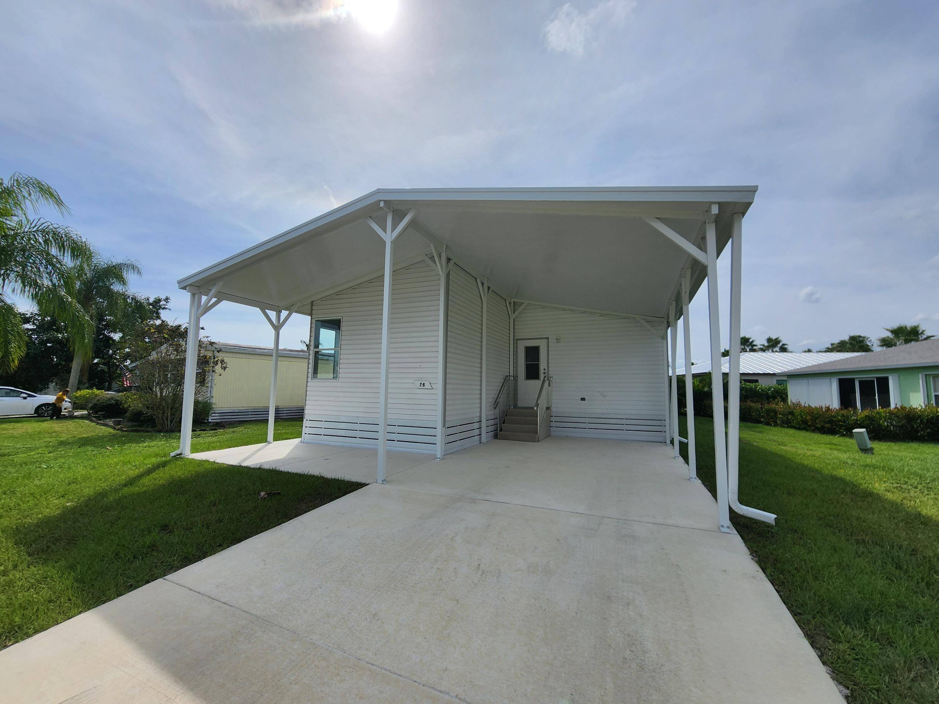 Discover coastal living at its finest with this charming 2 bedroom, 2 bath manufactured home in the desirable 55 community of Spanish Lakes One !