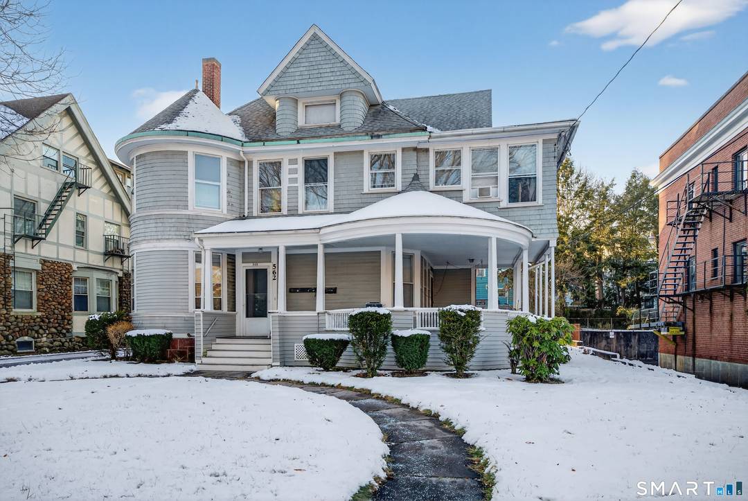 Stately 4226 SQ FT 4 family building in the heart of the East Rock with a wrap around porch, perfect for an owner occupant or as an investment property.