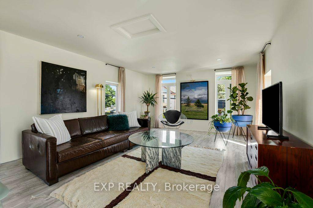 Welcome to 297 Main Street in Bloomfield a bright and inviting upper level apartment set in the heart of one of Prince Edward County's most cherished villages.