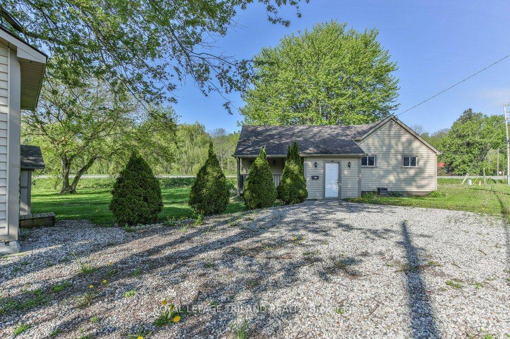 Property located in the village of Vienna on a larger corner lot with mature trees.