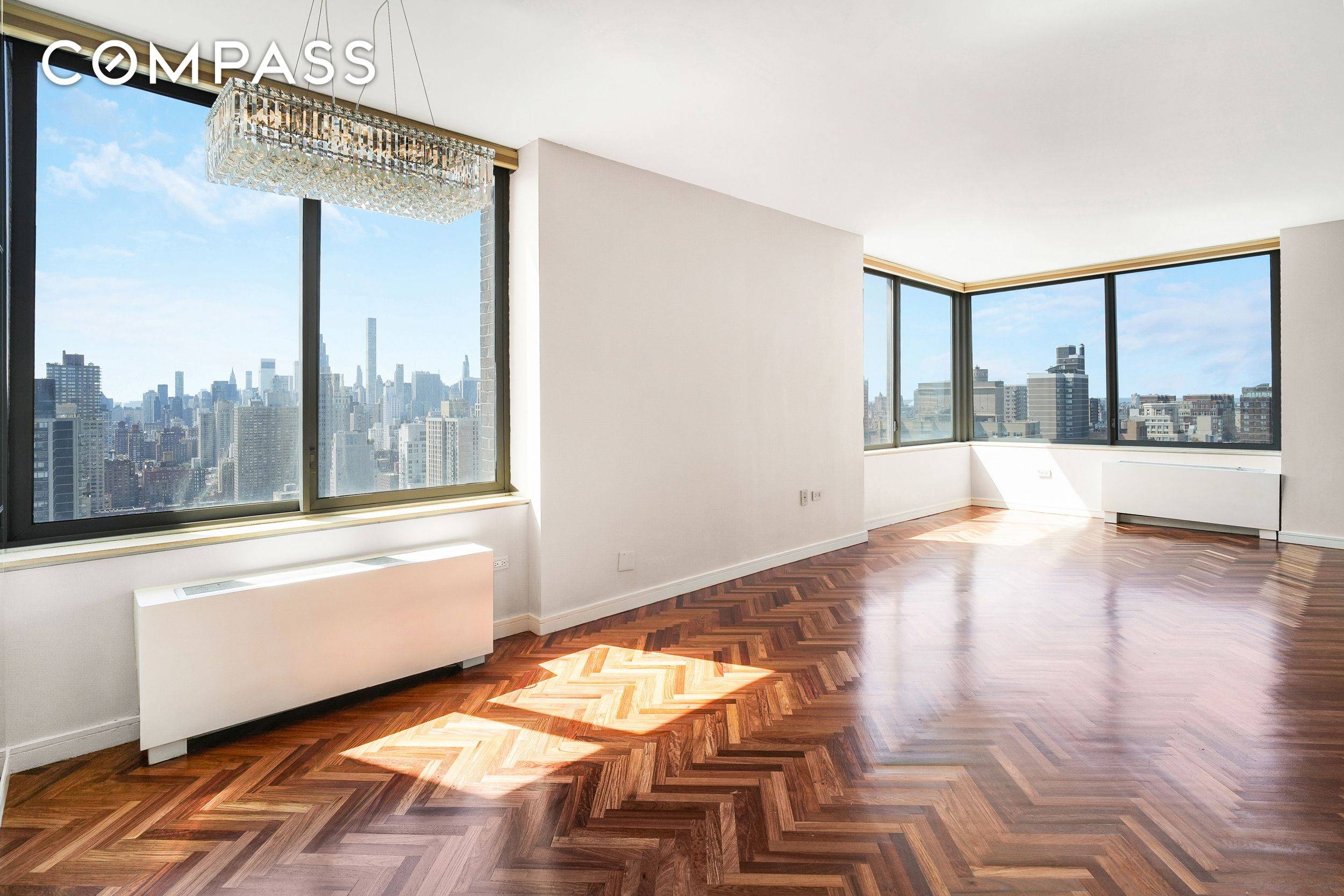 Soaring above the city, this highly coveted, convertible 3 bedroom, 3 bathroom, corner A line at The Leighton House is one of the best lines in the building.