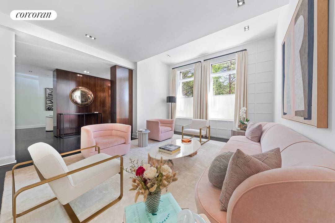 This dramatic three bedroom, four bathroom duplex home at 170 East End Avenue redefines townhouse style living within one of Manhattan's most sophisticated full service condominiums.