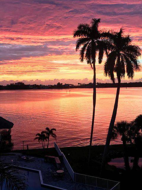 FABULOUS VIEW ! WIDE INTRA COASTAL, TOTAL RENOVATION LESS THAN 3 YEARS AGO, ALL NEW APPLIANCES, A C, WATER HEATER, FLOORS, KITCHEN AND BATHS.
