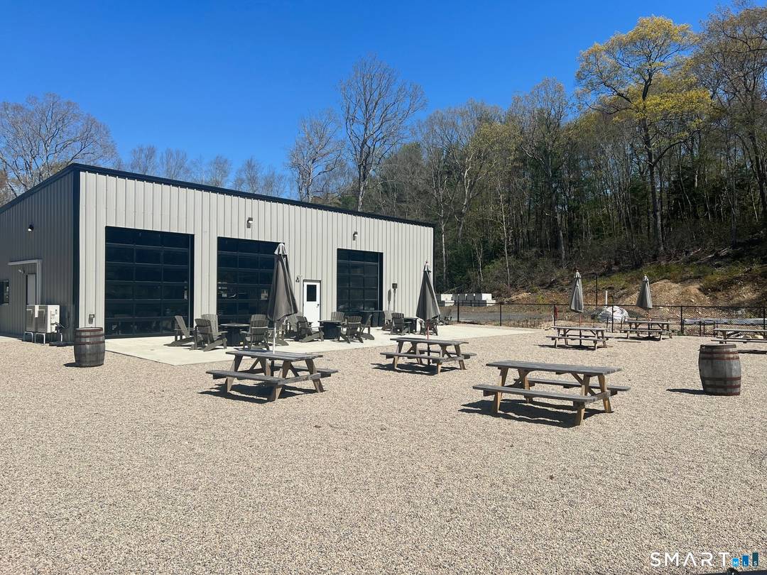2, 400 SF commercial building with overhead doors, 14' ceiling, 4 handicap bathrooms.