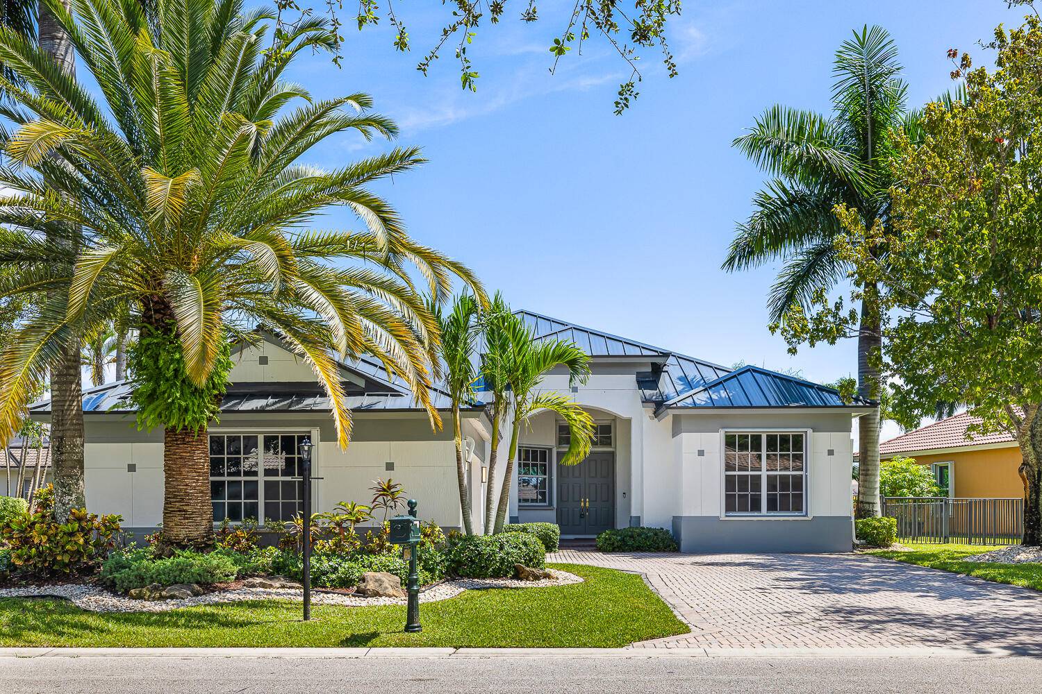 Welcome to Parkland Isles, a 4 bedroom, 3 bath home with wide water views and a layout made for easy living.