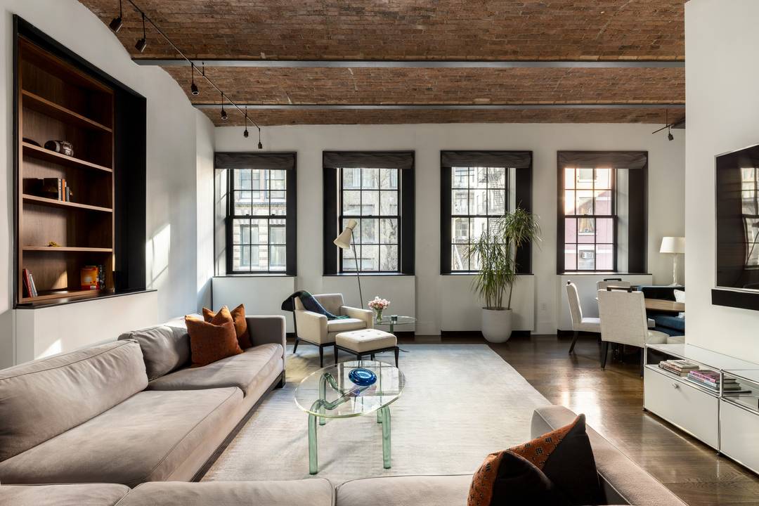 Originally built as a two bedroom, two and a half bath, this residence is now configured as an oversized one bedroom.