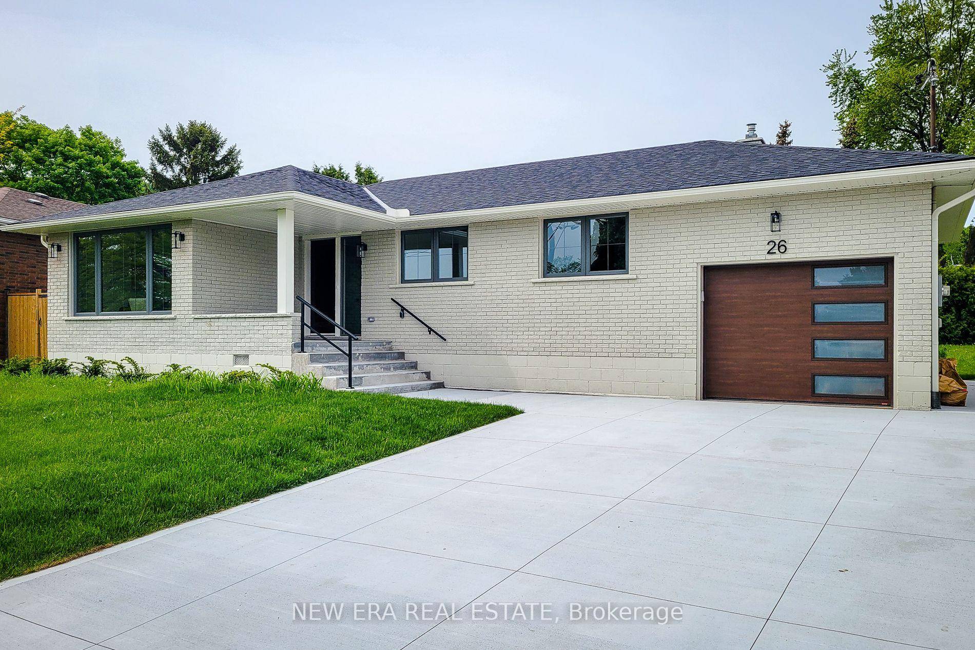 This stunning, fully renovated 3 bedroom, 2 bath bungalow offers 1255 sq ft of stylish, carpet free living space.