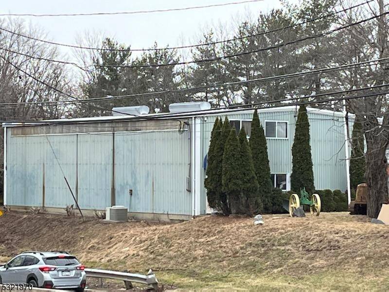 This prime commercial property on Rt 206 in Hillsborough, New Jersey is in a highly desirable and busy highway location, currently used for automotive purposes.