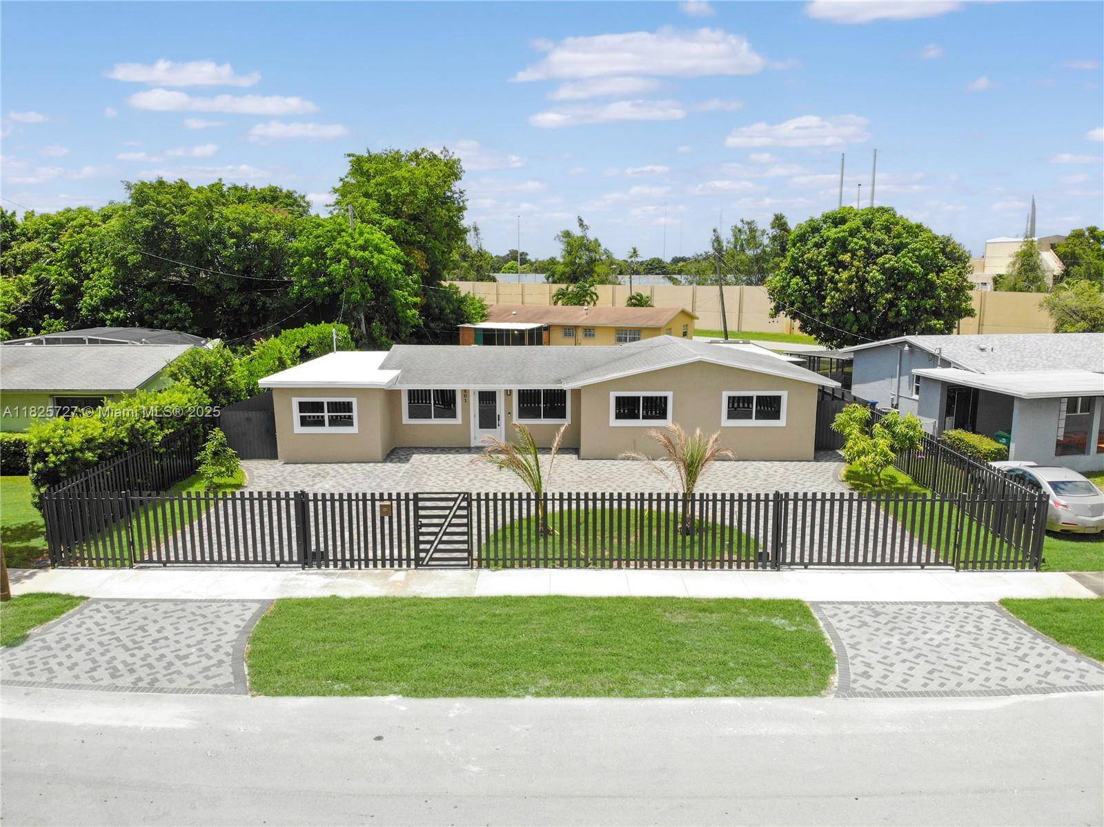 Stunning 6 bed, 4 bath home in the heart of Miami Gardens featuring modern upgrades and a resort style backyard !