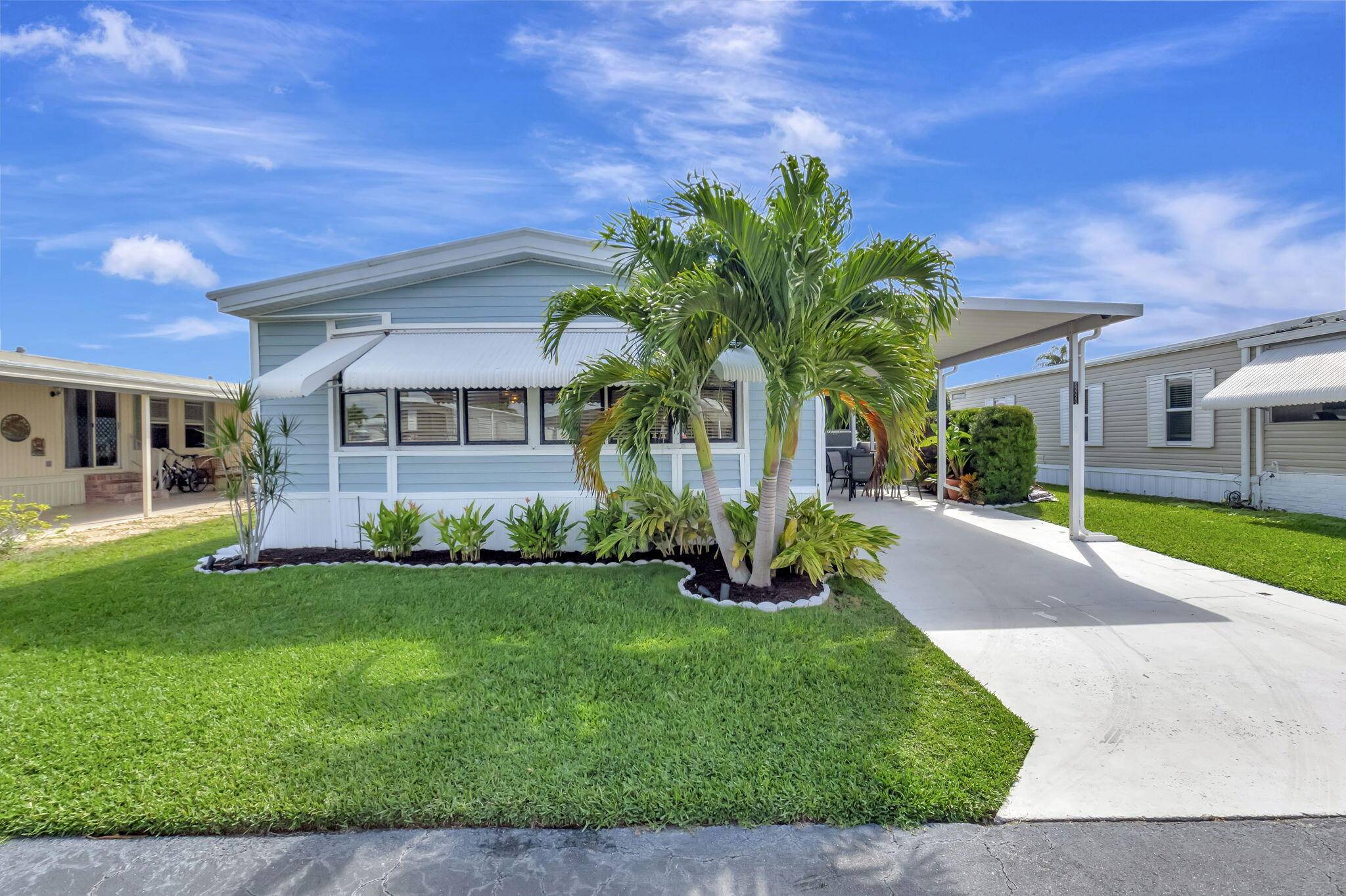 100 TURNKEY ! This meticulously maintained home is fully furnished with light and airy coastal decor and awaiting its new owner.