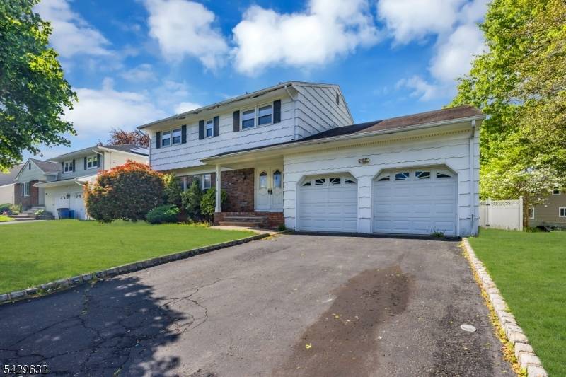 Welcome to 712 Moses Drive, a well cared for Colonial on an oversized lot 75x100, offering spacious, comfortable living.