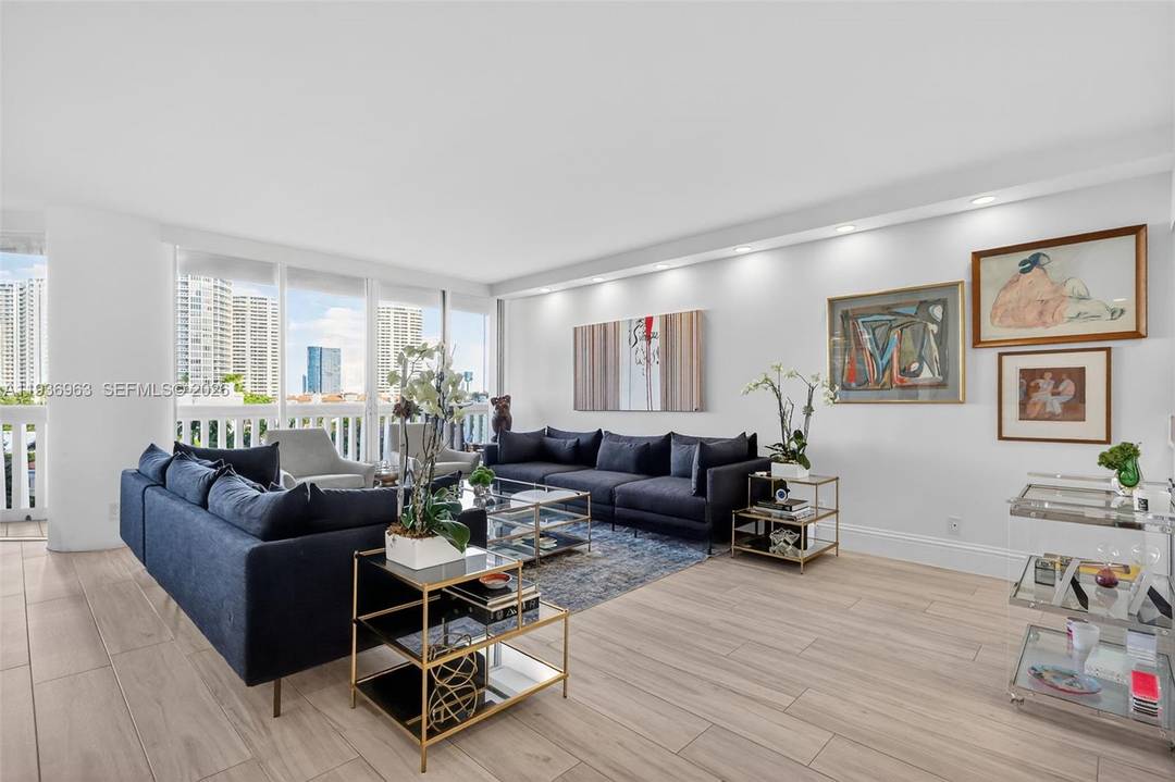 Beautifully fully renovated flow through residence offering 1, 696 square feet of refined living with sunrise and sunset views.