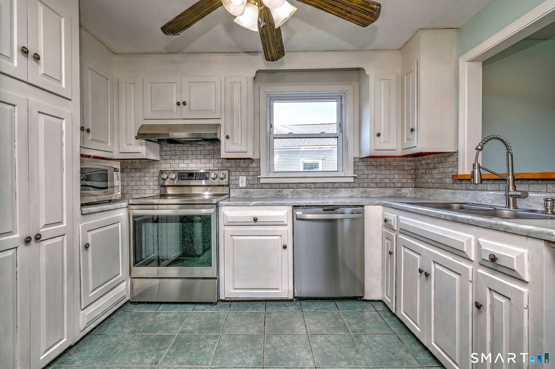 Welcome to this stunning, move in ready 5 bedroom Colonial offering picturesque water views and exceptional living space.