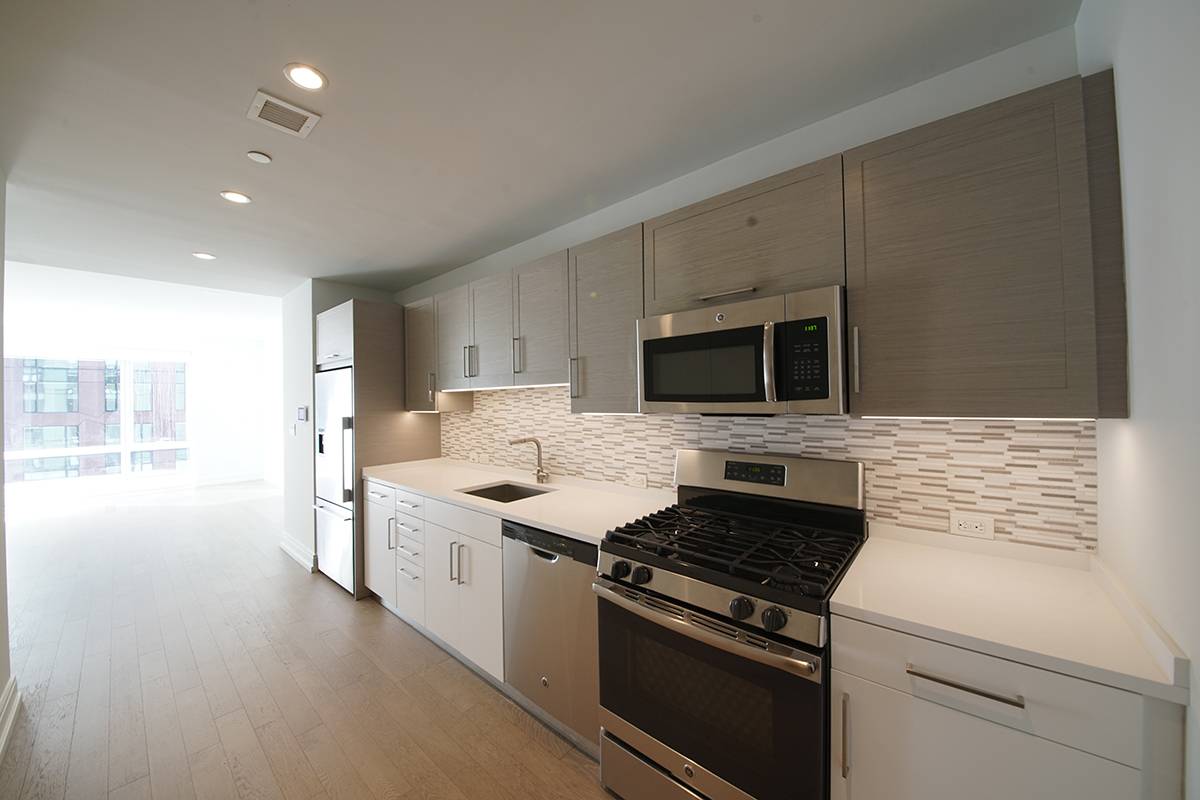 With sweeping views of the city from sunrise to sunset 555TEN towers over the new West Side.