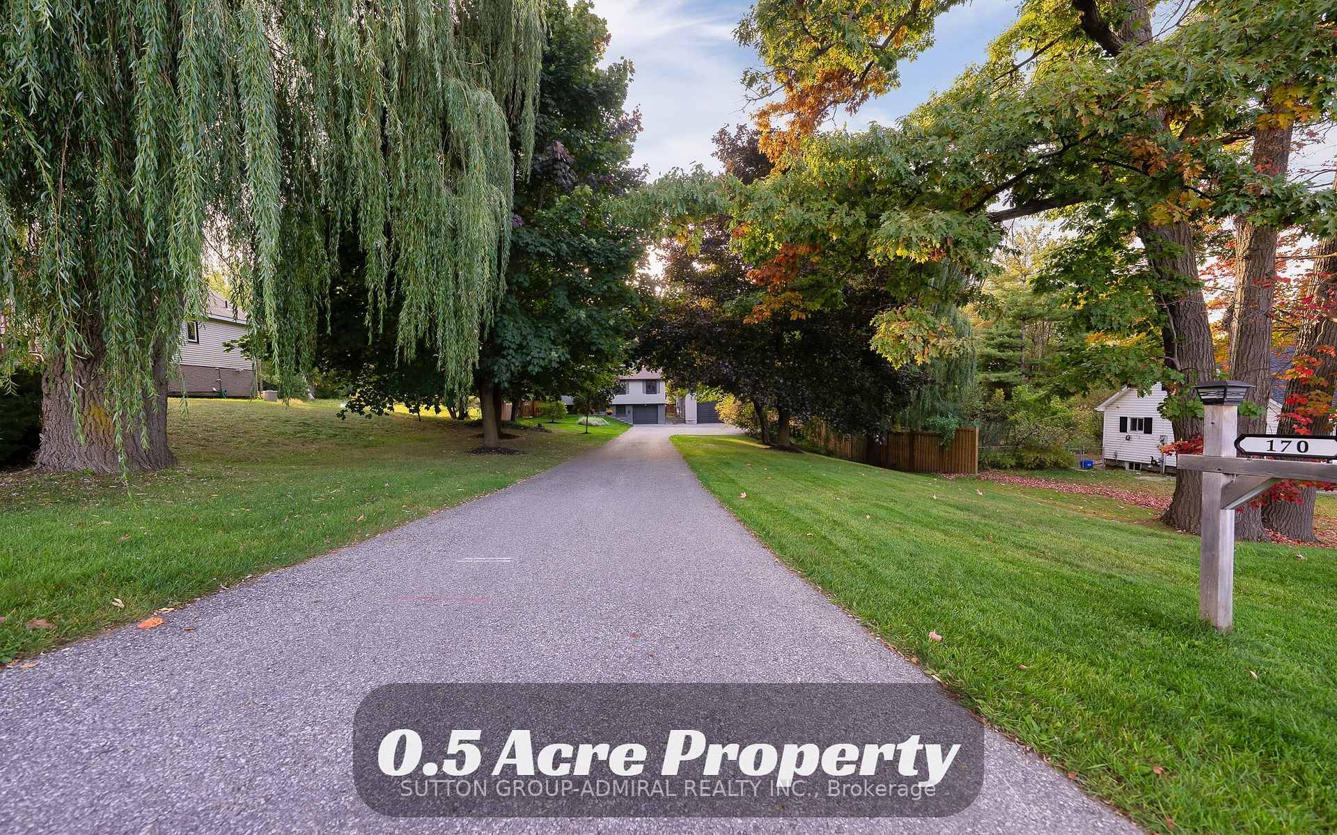 0. 5 ACRE PROPERTY W INSULATED WORKSHOP, Garage, Separate Entrance To The Basement And More !
