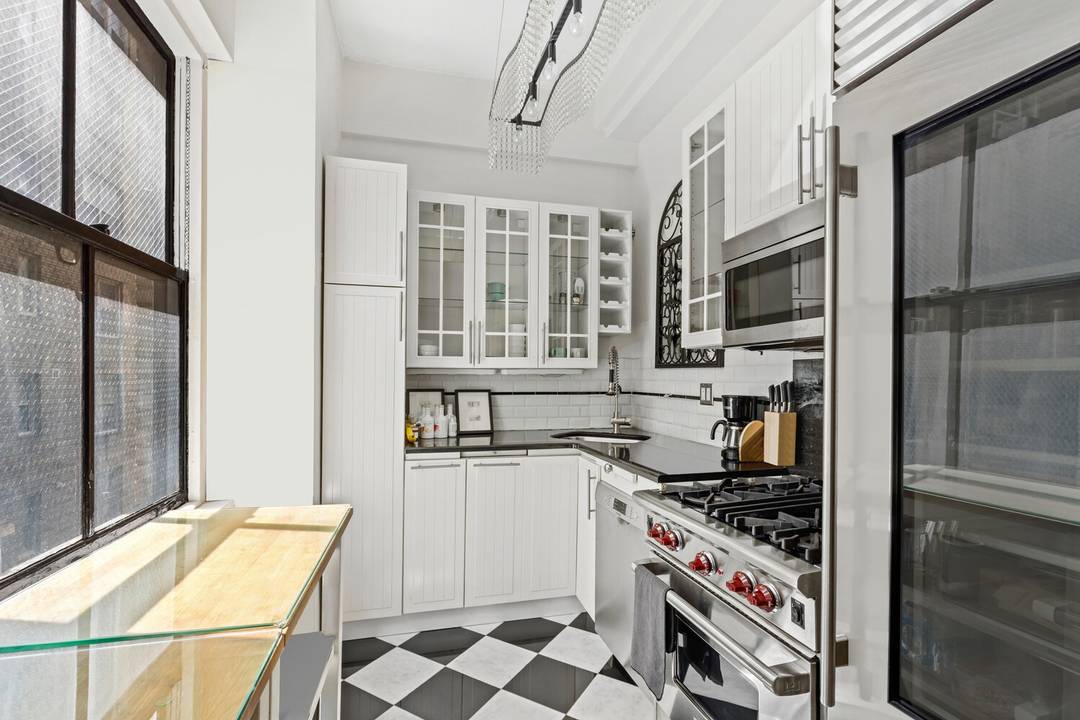 Welcome to Residence 5J at The Sage House a truly special home offering low monthly maintenance, prime location, and timeless architectural character.