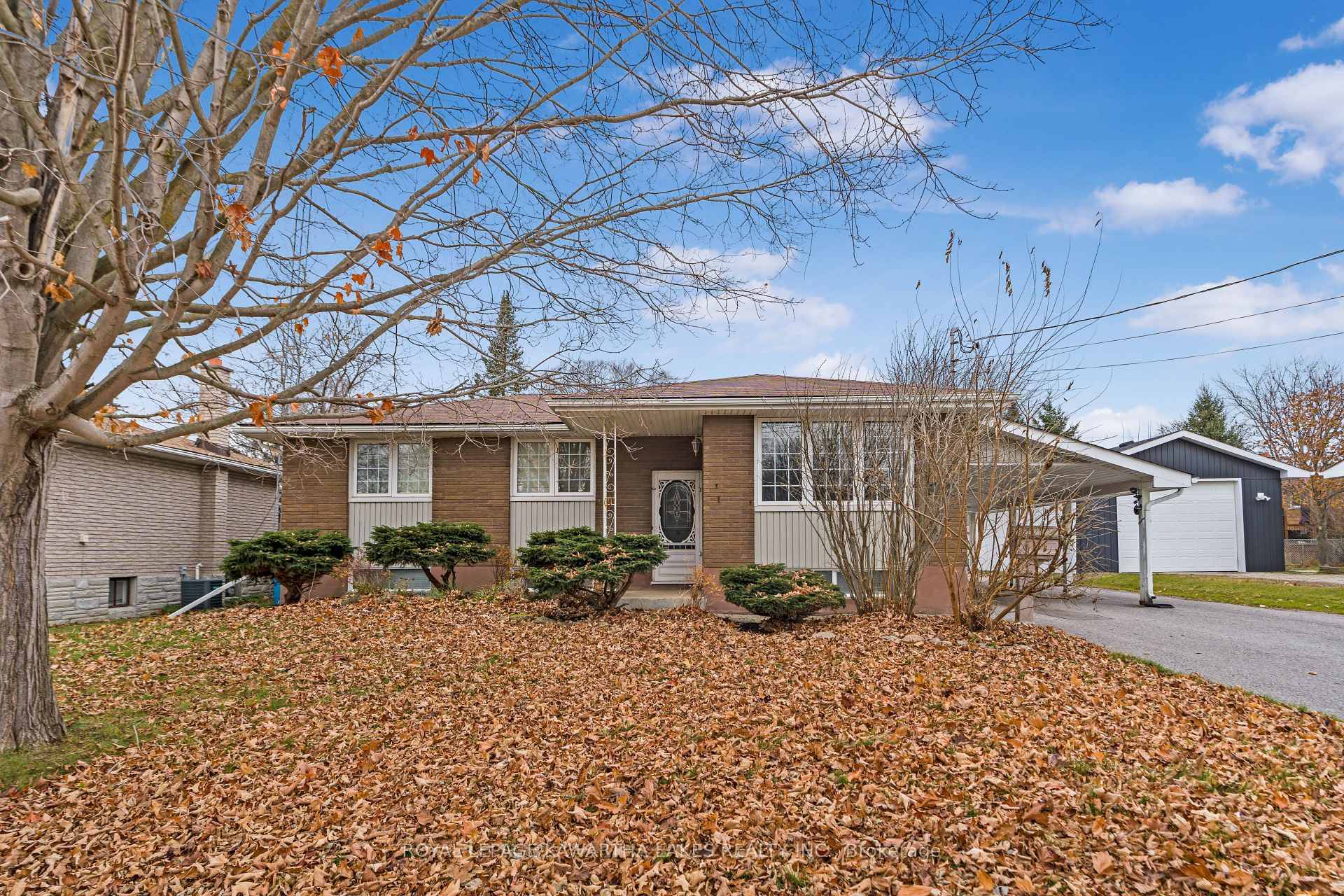 Welcome to this Charming Bungalow with In Law Suite amp ; Entertainment Ready Yard !