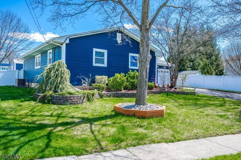 Welcome to 10 Wellington Ave in Port Reading, a beautiful custom ranch style home offering 4 bedrooms and 2.