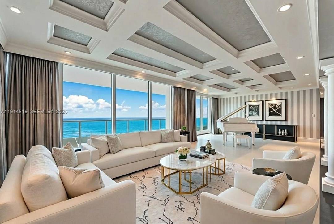 This exceptional penthouse offers remarkable space and ocean, city, and intracoastal views that fill every room.
