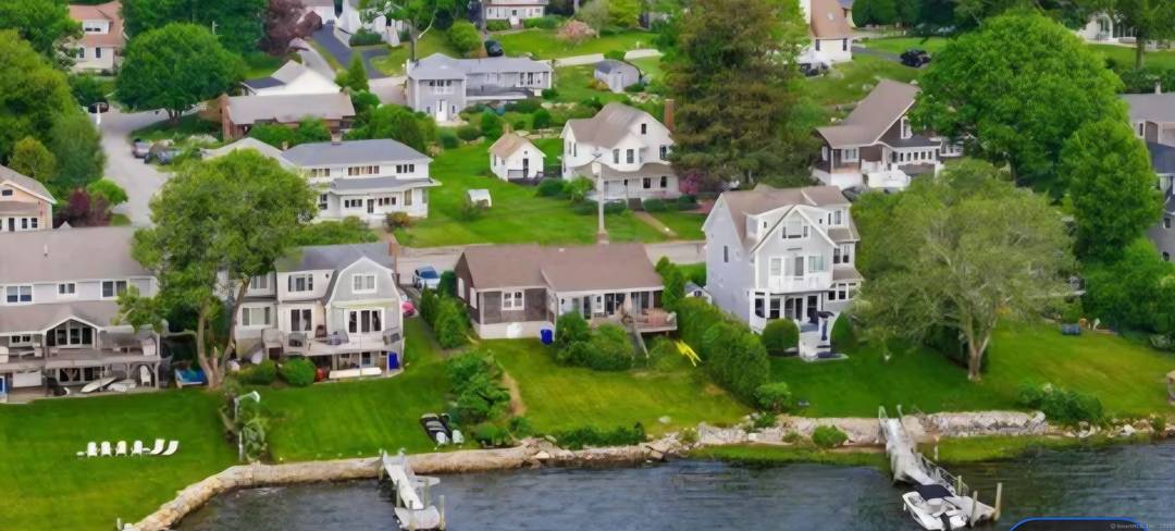 Furnished Noank Colonial across from Beebe Cove with year round views.