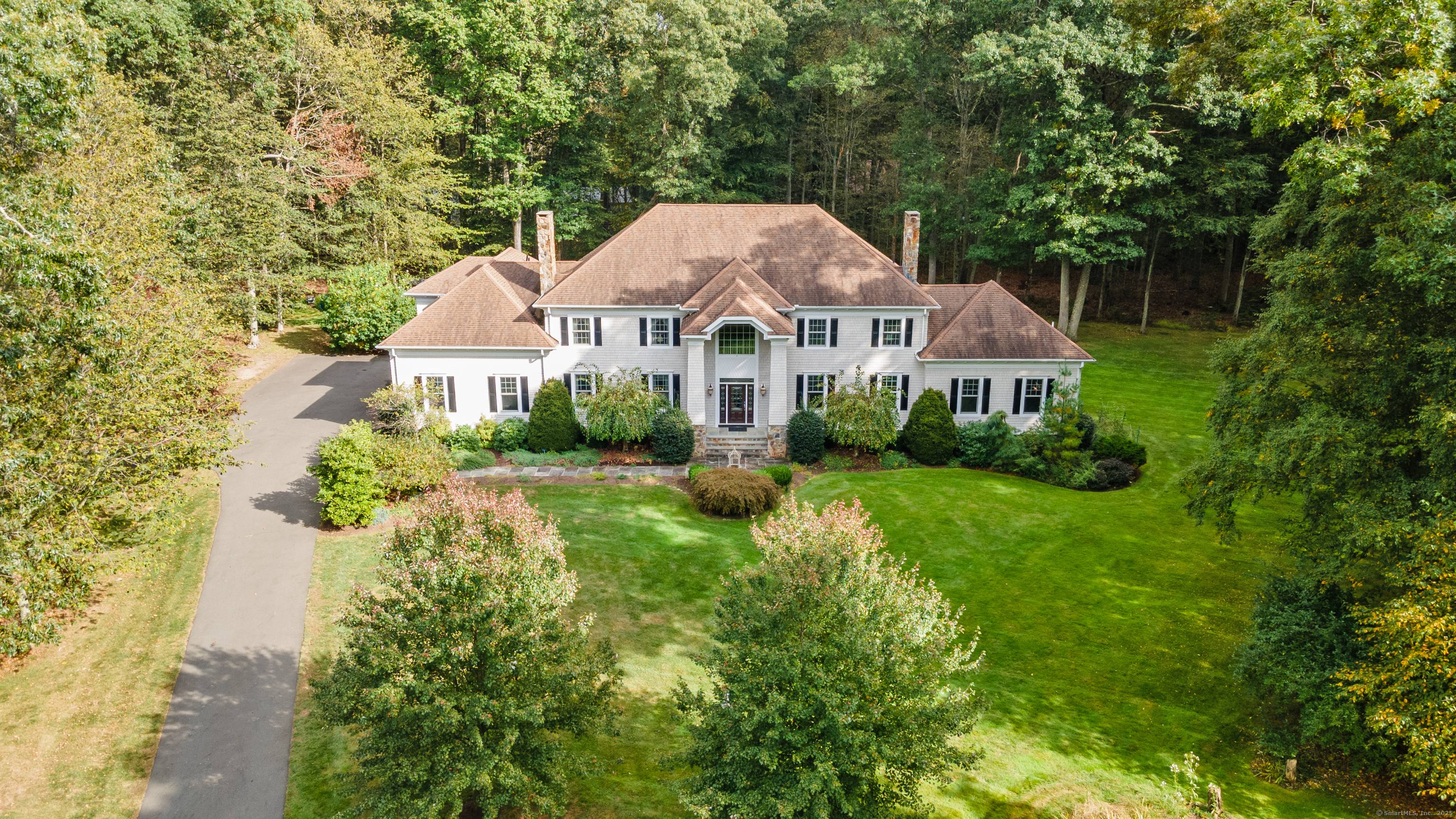 Tucked away at the end of a serene cul de sac, this elegant 4BR, 6BA Colonial offers a perfect blend of timeless charm and modern comfort.
