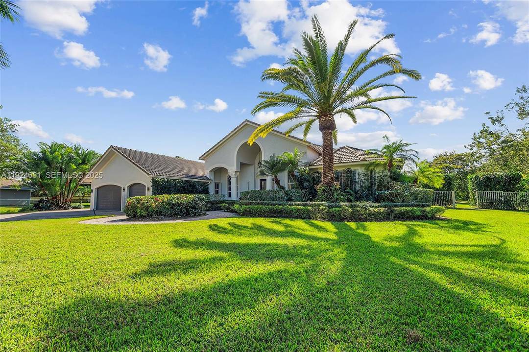 Set within the gated enclave of Emerald Springs Estates, this modern elegance is on the community s largest lot with 1.