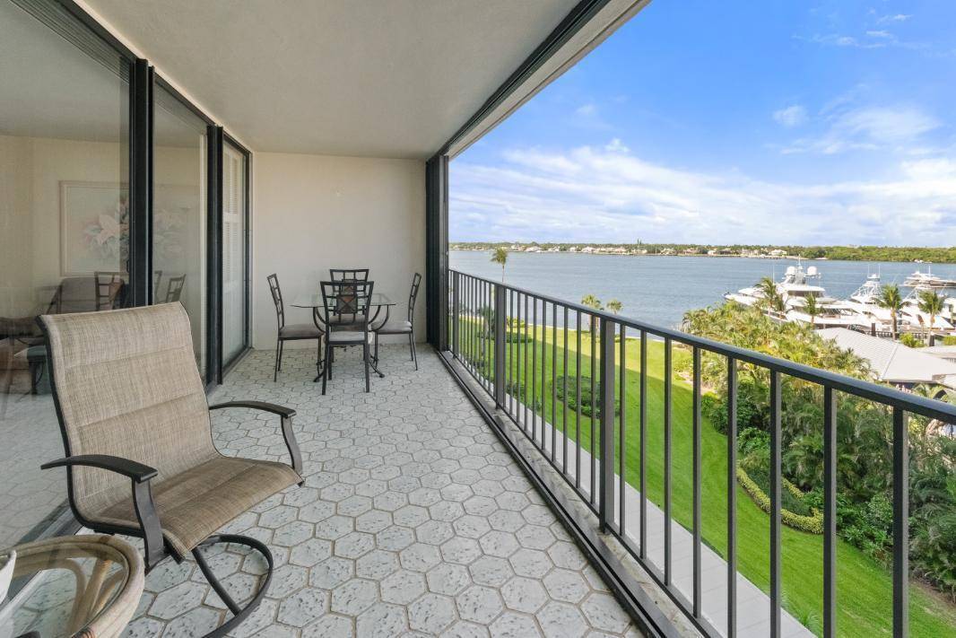 Amazing views of the Ocean, Bay, and Marina from this deluxe floor plan condo in Old Port Cove.