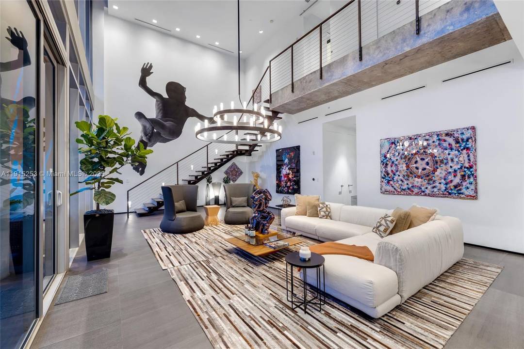 A tico Wynwood is a one of a kind, two level live work penthouse with dramatic architecture and iconic indoor outdoor living.