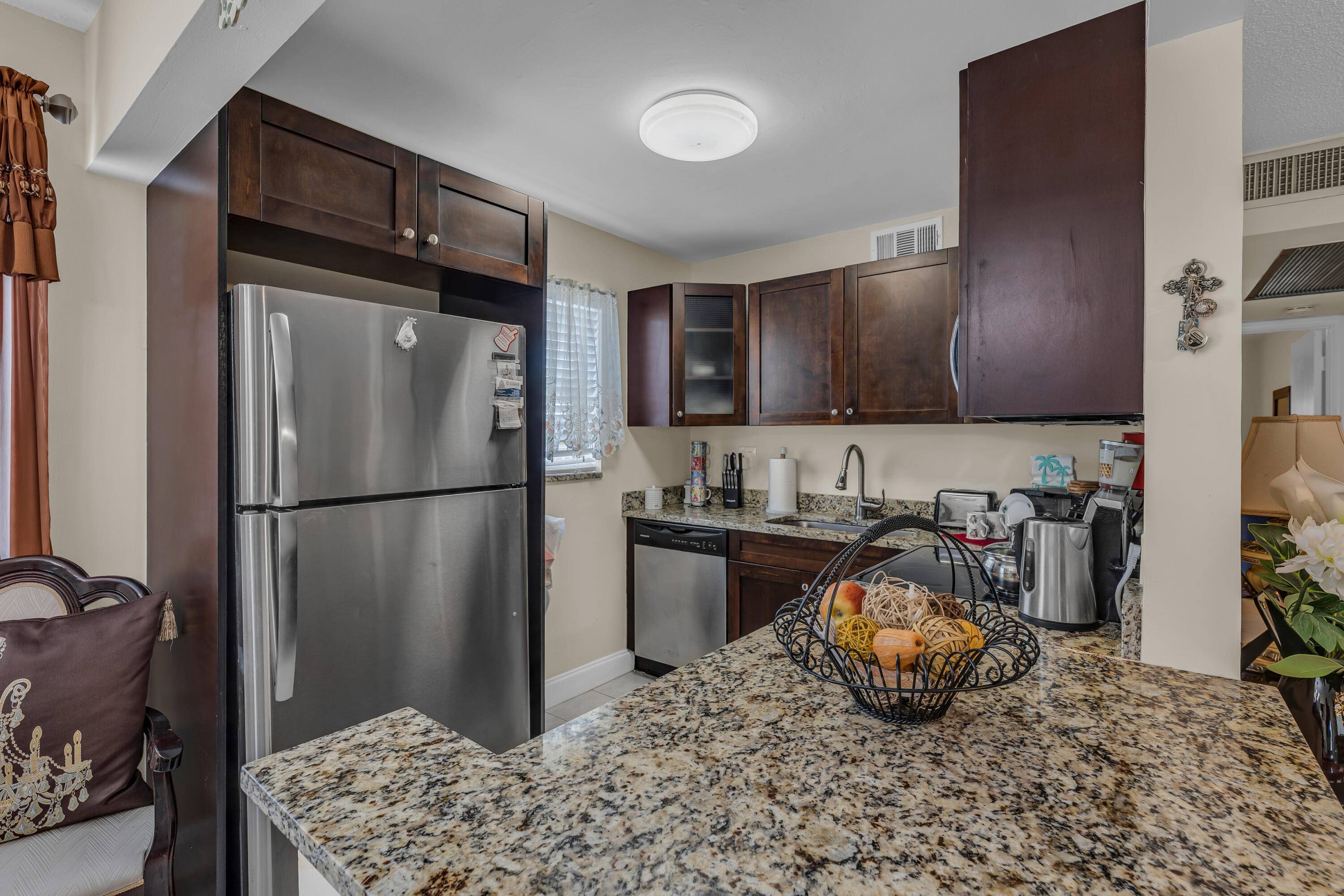 Beautiful second floor corner unit, two bed, 2 bath, central A C condo recently renovated.