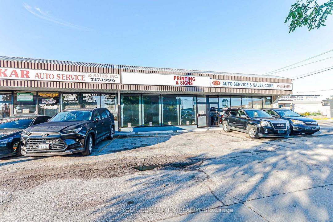 Fully equipped auto body shop with spray booth, air compressor, ventilation system, paint prep area, tools, shelving and shop equipment.