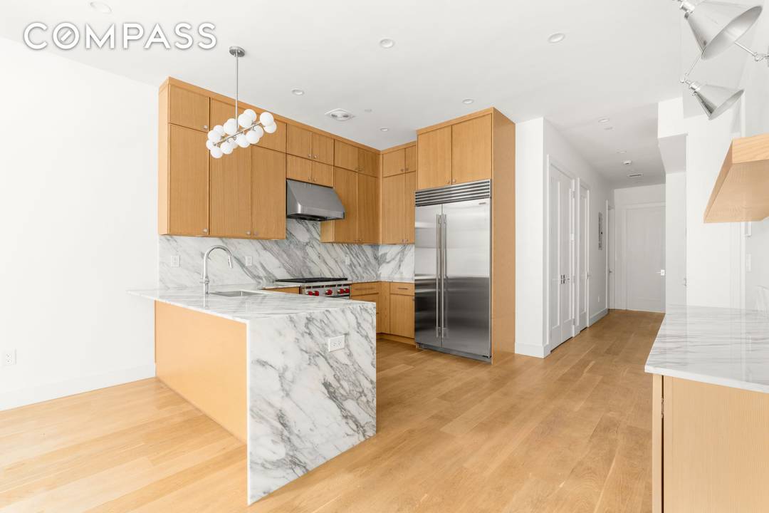 Introducing the Parlor Garden Duplex at 347 Sixth Avenue, a beautifully renovated two bedroom, two bathroom residence where refined design and exceptional craftsmanship meet modern living featuring a private backyard.